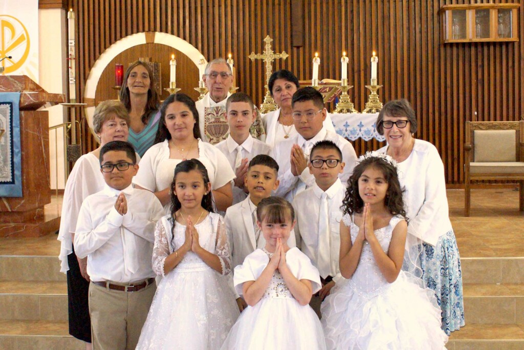 children receiving first communion