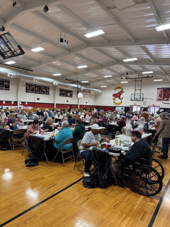 Bingo crowd gathered in gym.